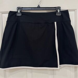Women’s Athletic Skort. Black with white trim. Size Large.